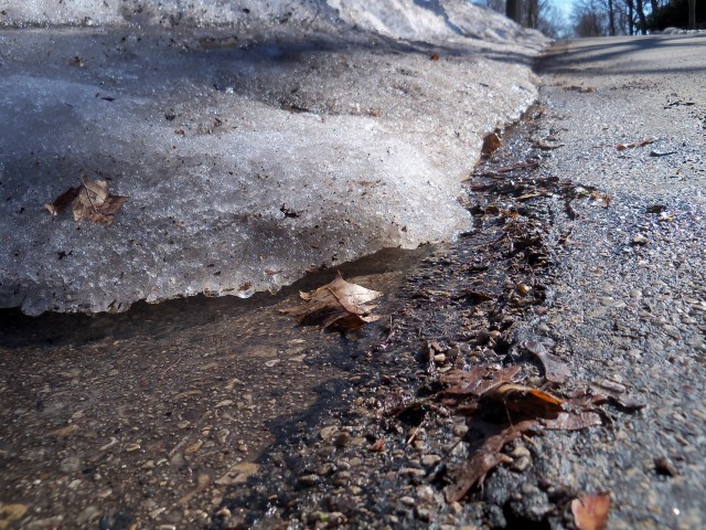 Melting ice at the curb