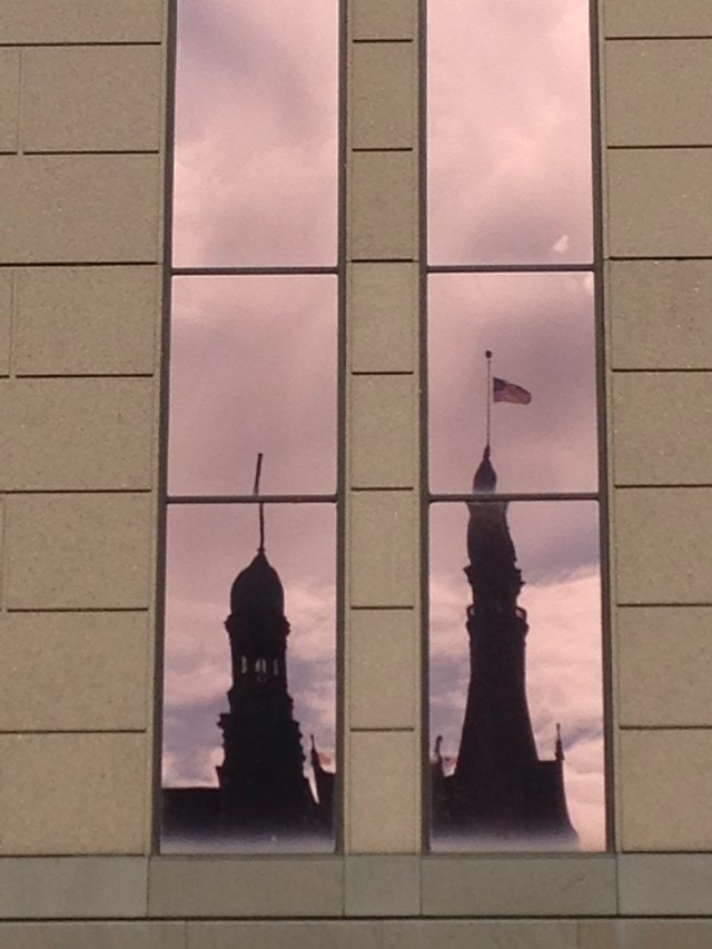 Milwaukee City Hall reflected in glass windows