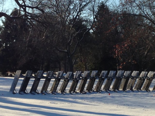 picnic tables, stacked together, winter