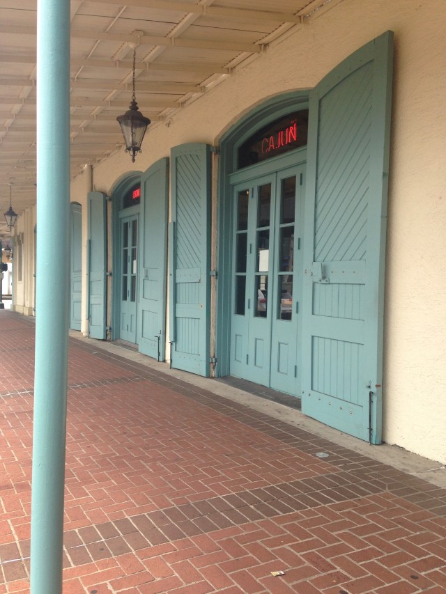 Shutters on French doors at Mulates in New Orleans