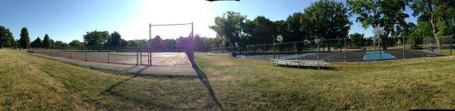Abandoned and converted tennis courts panorama