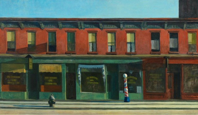 small town storefronts on a sunny morning