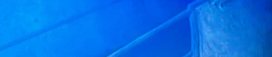 underwater image of the sunken Edmund Fitzgerald, with the name of the ship visible