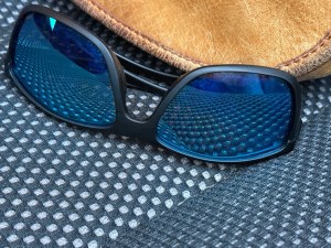 Sunglasses reflecting car seat "polka dot" pattern